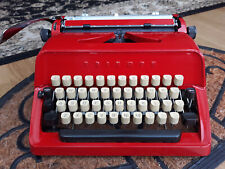 Beautifull red Triumph portable vintage typewriter with case picture