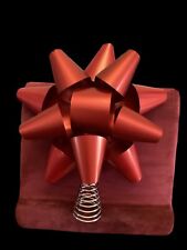 Large red metal bow Christmas tree topper picture