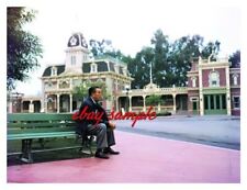 WALT DISNEY COLOR CANDID PHOTO - Sitting in Disneyland's Town Square, Circa 1955 picture
