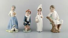 Lladro, Tengra and Zaphir, Spain. Four porcelain figurines of children picture
