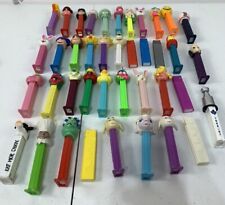 40 Assorted Sizes And Characters Pez Dispensers picture