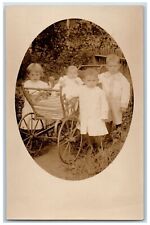 Little Kid Baby On Stroller Postcard RPPC Photo Unposted Antique c1910's picture
