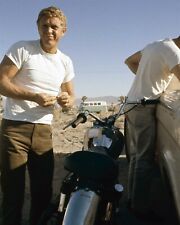 Steve McQueen in white t-shirt stands next to bike in desert 1960's 5x7 photo picture