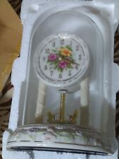 An AVON EXCLUSIVE WEIGHTED TABLETOP HUMMINGBIRD Clock Unused New In Box Flowers  picture