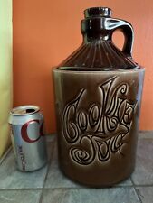 Vintage McCoy COOKIE JUG Pottery COOKIE JAR Brown MOONSHINE BOTTLE Shape picture