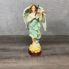 Beautiful Decorative Angel Statue with Violin and Floral Crown picture