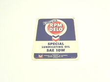 VINTAGE 1960S DELO LUBRICANT OIL COMPANY WATER TRANSFER DECAL ON METAL SUPER RPM picture