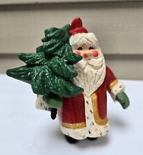 1994 HOUSE of HATTEN Red Santa Claus Holding a Christmas Tree Ornament  picture