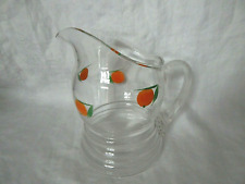 VTG CLEAR GLASS WIDE BASE JUICE PITCHER WITH PAINTED ORANGES RIBBED HANDLE picture