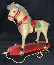 ANTIQUE GERMAN PULL TOY - CLOTH HORSE ON WHEELED PLATFORM picture