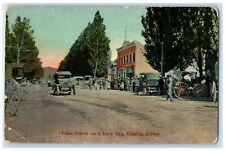 1911 Main Street on a Busy Day Oakley Idaho ID Antique Posted Postcard picture