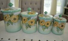 Dorothy Long Hand Painted Set of Four Porcelain Canisters Green w/ Yellow Flower picture