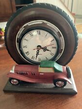 Vintage quartz Clock in Tire with Car picture