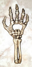 Cast Iron Skeleton Hand & Forearm Beer Bottle Opener Skull picture