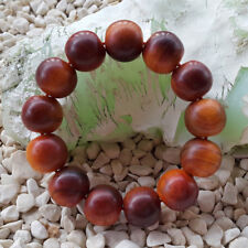 Adorable 18 MM Raja Kayu Indonesian Red Agathis Bracelet 13 Translucent Beads 03 picture