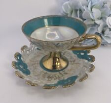 Lefton Hand Painted Turquoise & White Cut Out Iridescent Teacup & Saucer Set. picture