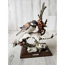 G Armani Sparrow bird Captain amante Florence 1989? Figuring statue berries bran picture