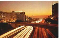 VINTAGE POSTCARD LOS ANGELES HARBOR FREEWAY AT DUSK picture