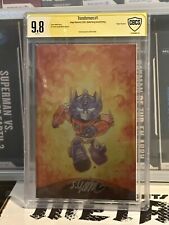 Transformers #1 CBCS 9.8 Signed By Skottie Young Second Print Virgin Foil Cover picture