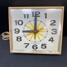 VINTAGE GENERAL ELECTRIC CLOCK, MODEL 2198, YELLOW STARBURST WORKS picture