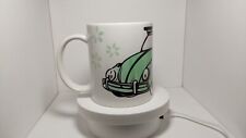 Handmade VW Beetle watercolor green coffee mug cup. Surrounded by spring flowers picture