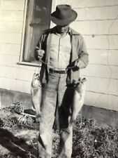 A8 Photo Handsome Mystery Man Hiding Face With Hat Shows Off Fishing Catch Fish picture