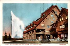Postcard Old Faithful Inn and Geyser at Yellowstone National Park, Wyoming picture