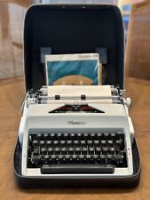 Vintage 1969 OLYMPIA DE LUXE SM9 Typewriter w/Case, Manual, Guarantee From 1967 picture