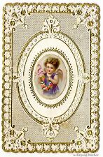 C. 1850 extra fine die cut paper scrap with an Angel medallion in the center picture