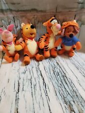 4 Stuffed Characters From Winnie The Pooh picture