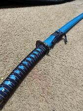 Blue turquoise black spotted sword picture