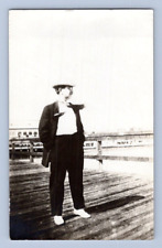 RPPC 1918. LONG BEACH PIER, CAL. MAN STANDING IN THE WIND. POSTCARD ST4 picture
