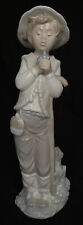 Lladro NAO Young Boy Holding Bird 10.5” picture