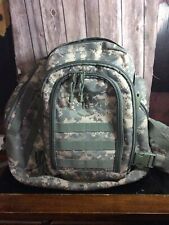 military backpack. used. Camouflage expandable picture