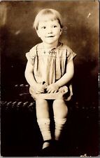 c1910 CUTE LITTLE GIRL TWINKLING EYES LIKELY TALKING RPPC PHOTO POSTCARD 36-143 picture