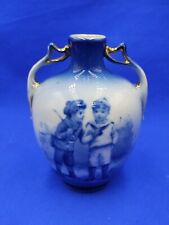 Vintage Small Blue And White Vase With Two Boys  picture