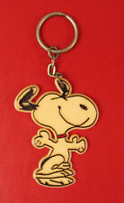 VINTAGE SCHULTZ SNOOPY PEANUTS AUTOMOTIVE KEY CHAIN MUSIC SONG CARTOON FUN TV  picture