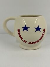 McCoy Smiley Face Mug in White with Blue Star Eyes and SMILE AMERICA Mouth picture
