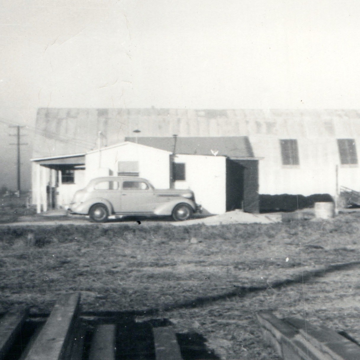c1940s Quonset Hut Dance Hall Construction Snapshot Photo Vintage Car Lumber Vtg c1940s Quonset Hut Dance Hall Construction Snapshot Photo Vintage Car Lumber Vtg