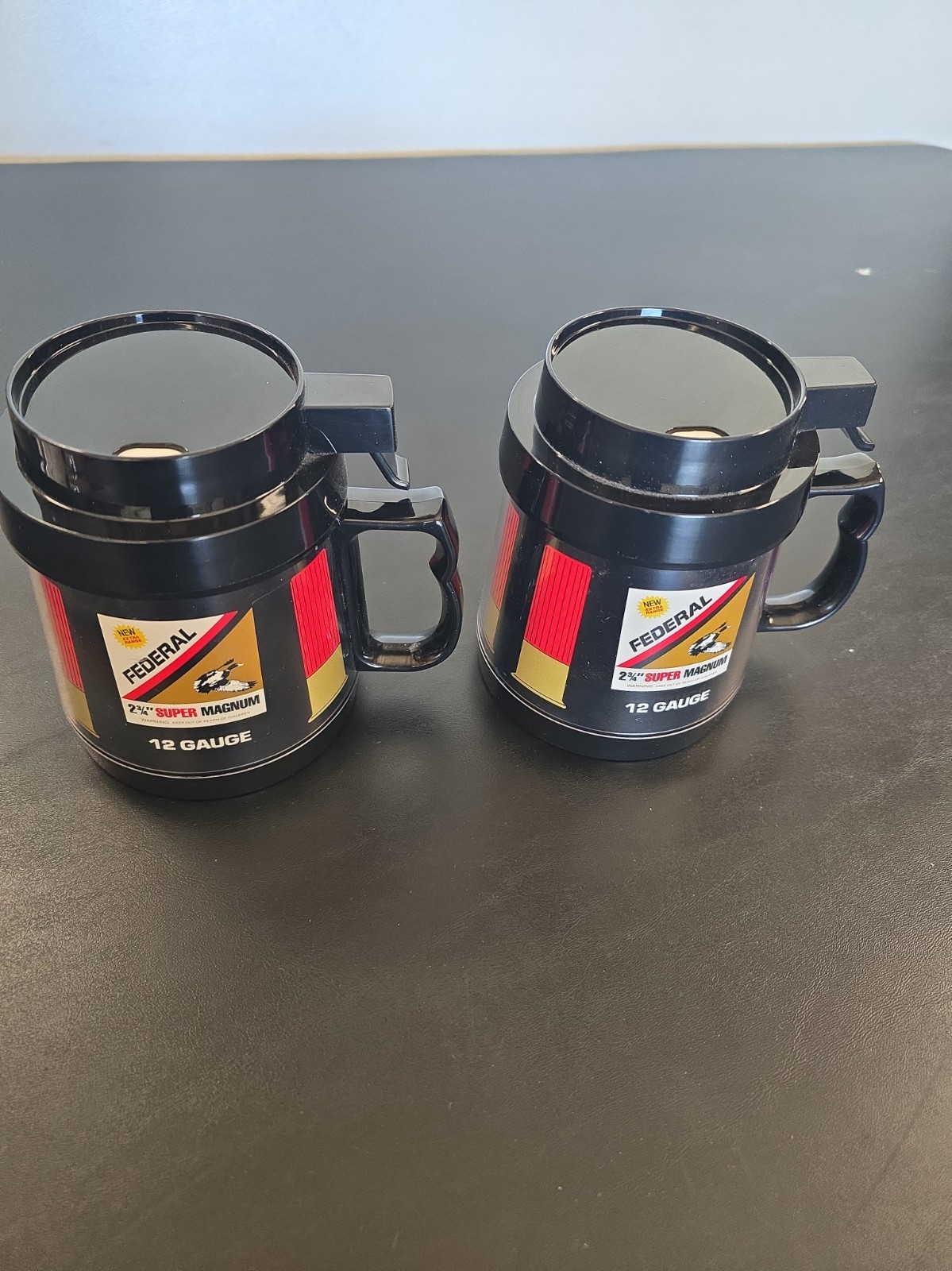 2 Vintage Federal Magnum 12 Gauge Shotgun Thermo-Serv Mug Cup NEW with Lid. 2 Vintage Federal Magnum 12 Gauge Shotgun Thermo-Serv Mug Cup NEW with Lid.