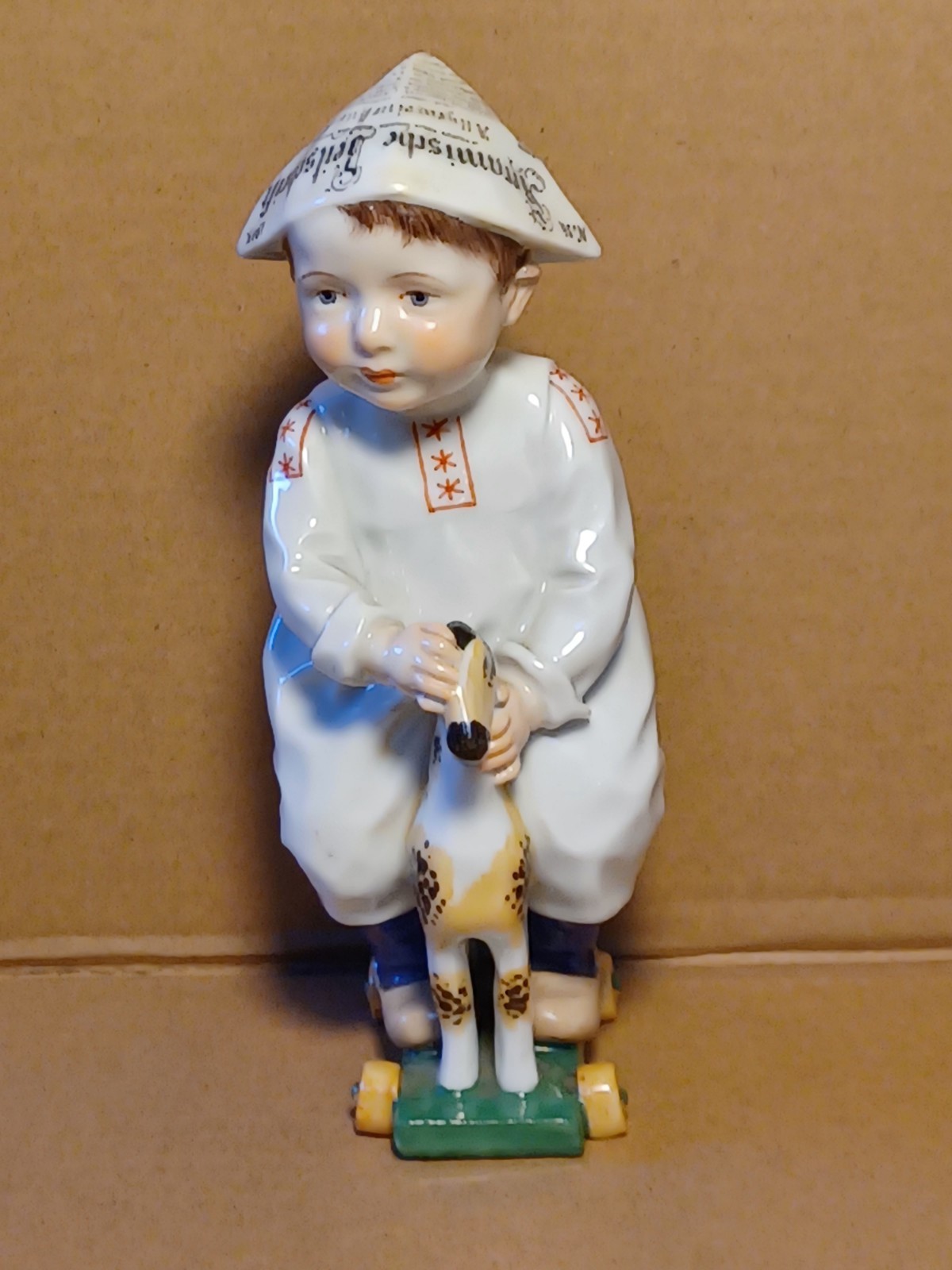 Konrad Hentschel Child with Newspaper Hat Antique German Figurine 1905 Konrad Hentschel Child with Newspaper Hat Antique German Figurine 1905
