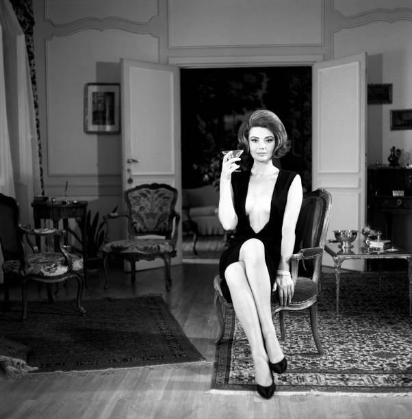 Croatian born Italian actress Sylvia Koscina posing a glass hand 1- Old Photo 3