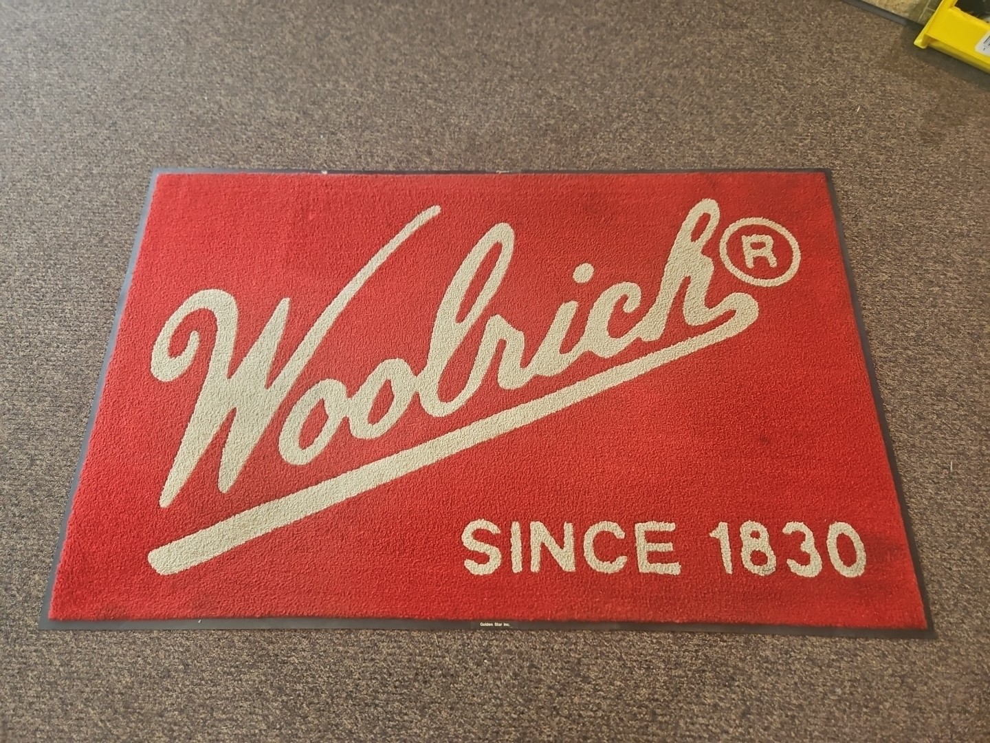 WOOLRICH CLOTHING ADVERTISING RUG *RIGHT OUT OF FACTORY STORE IN WOOLRICH PA*