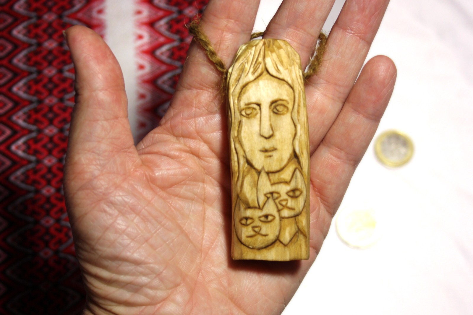 Wooden amulet goddess Freya. Norse goddess Freya.