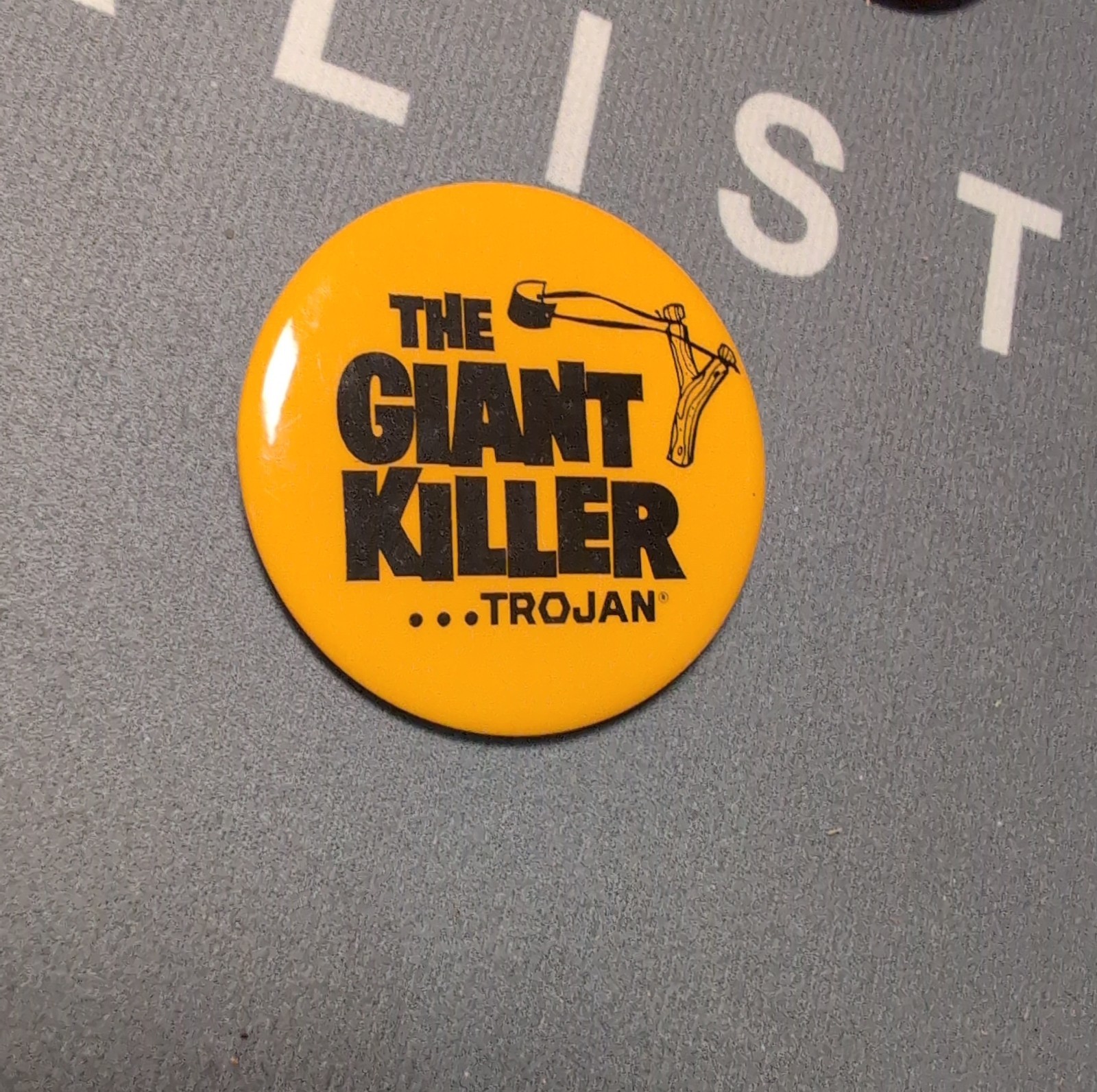 Vintage Trojan Condoms The Giant Killer Slingshot Advertising Pinback Button Vintage Trojan Condoms The Giant Killer Slingshot Advertising Pinback Button