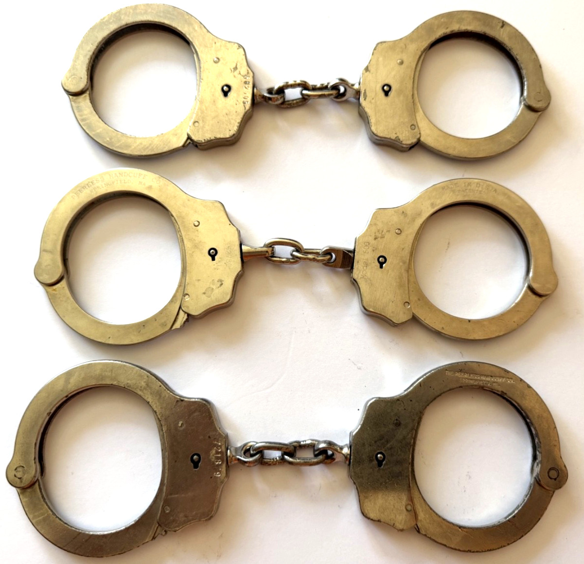3 PAIR OF VINTAGE PEERLESS CHAINED HANDCUFFS