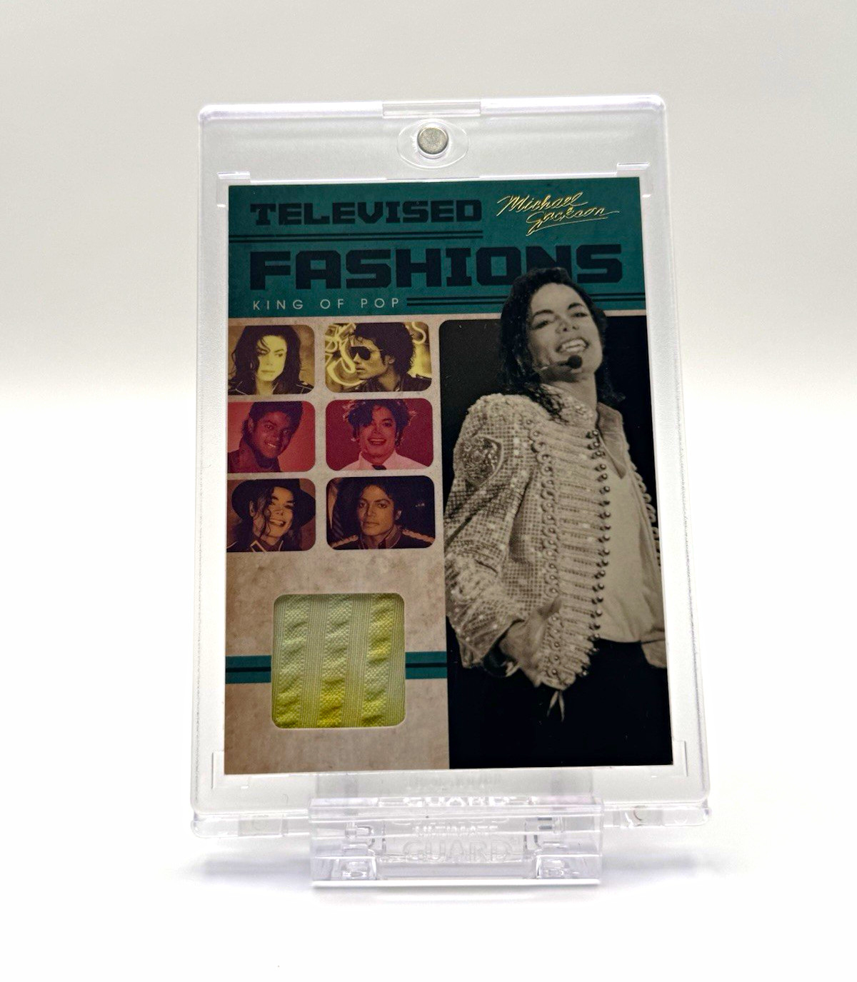 Panini 2011 Michael Jackson Televised Fashions Show Worn Relic Patch TV4 Panini 2011 Michael Jackson Televised Fashions Show Worn Relic Patch TV4