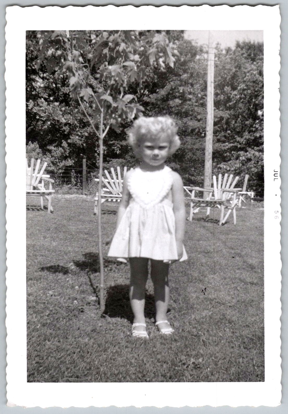 Vtg B&W Snapshot Cute Girl Curly Hair Heart Dress Yard Tree Lawn Chairs 1956 Vtg B&W Snapshot Cute Girl Curly Hair Heart Dress Yard Tree Lawn Chairs 1956