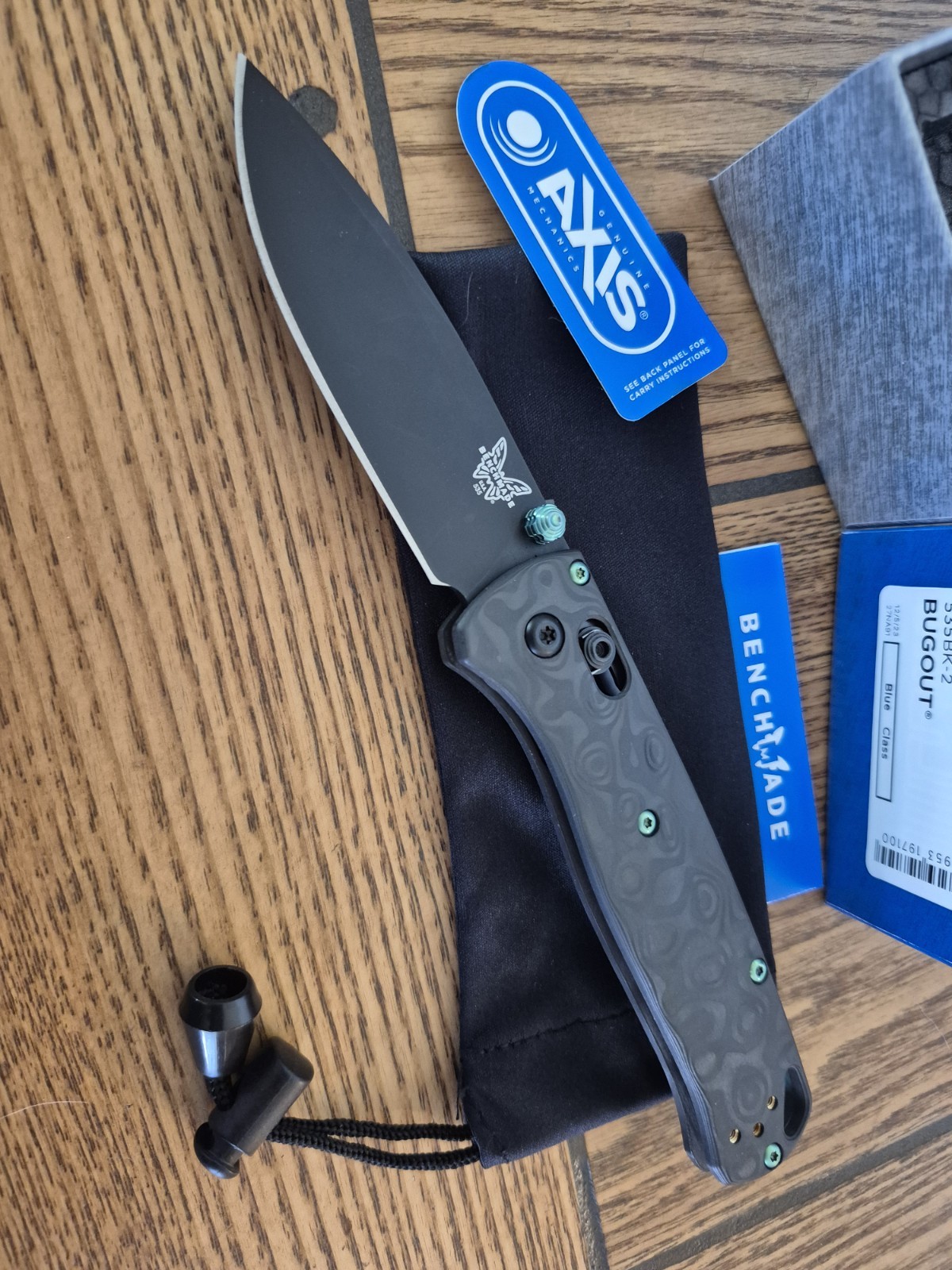 Custom Benchmade 535 Bugout Raindrop Carbon Fiber, Teal Hardware Custom Benchmade 535 Bugout Raindrop Carbon Fiber, Teal Hardware