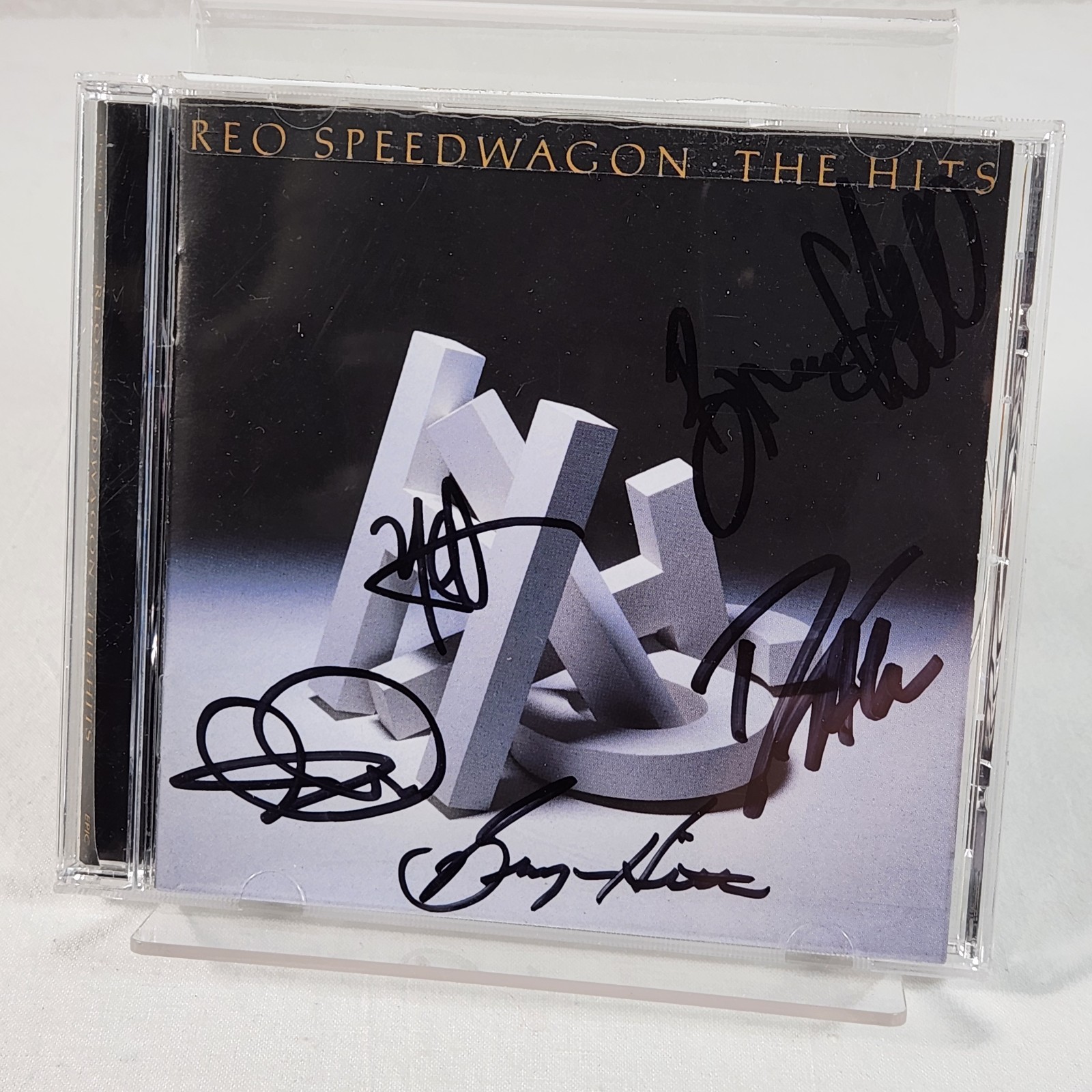 REO Speedwagon Band Autographed The Hits CD - 5 Members Signed Fast Ship